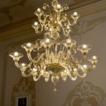 murano glass chandelier with lights on